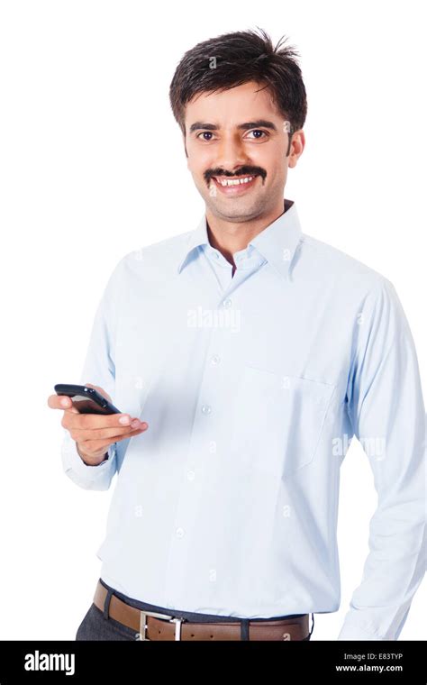 Indian Business Man Dialing Cell Phone Stock Photo Alamy