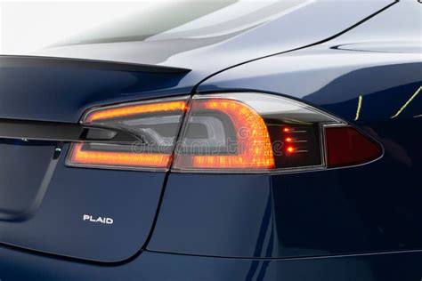 Closeup Of A Rear Light Of A Dark Blue Tesla Model S Plaid Editorial