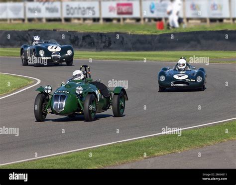 A Frazer Nash Le Mans Replica Leads Cooper Climax T39 Bobtail No4 And