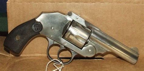 US Revolver Hammerless 38 S&W Revolver - Baer Auctioneers - Realty, LLC