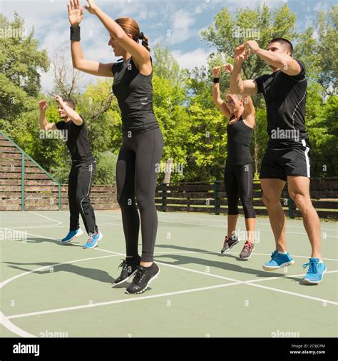 Aerobics, group of people in vigorous exercise Stock Photo - Alamy