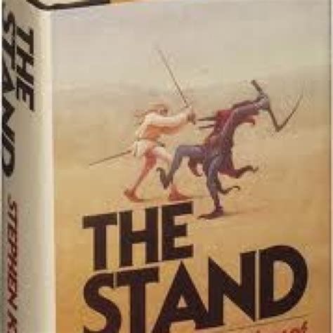 the stand book cover with two men fighting each other