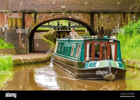 Canal Narrowboat Passing Under Bridge No On The Shropshire Union