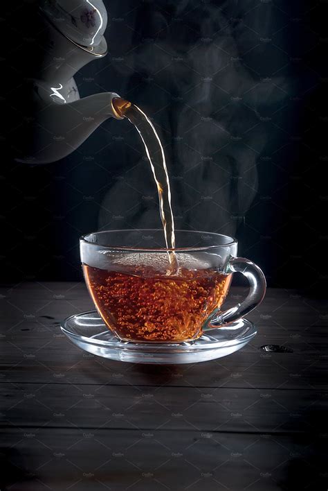 Cup Of Tea On Black Background Stock Photos Creative Market