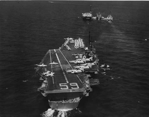 Uss Forrestal Cva Awaits Her Turn To Refuel While Operating In