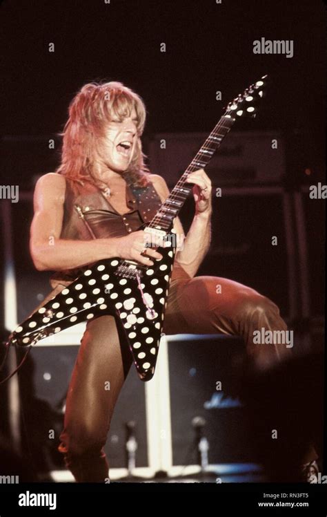 Guitarist Randy Rhoads Is Shown Performing On Stage During An Ozzy