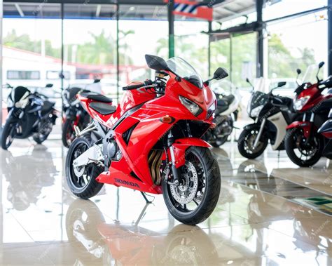 Modern speed motorbike in showroom with turbo electric engine data ...