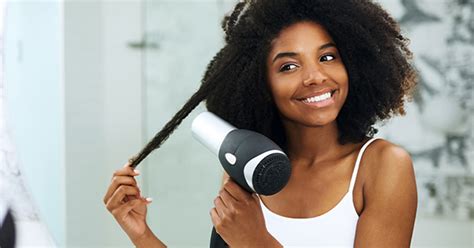 How To Straighten Natural Hair Without Damaging Your Curls