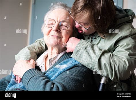 Down Syndrome Daughter Embracing 85 Yo White Mother Tienen Flanders