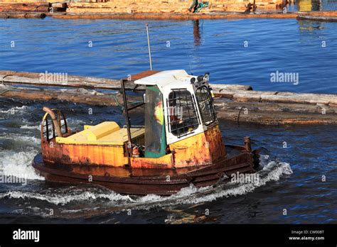 Log Boom Tugboat Operator At Gold River Logging Operation Stock Photo