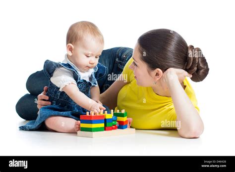 Mother And Baby Playing With Building Blocks Toy Isolated On White