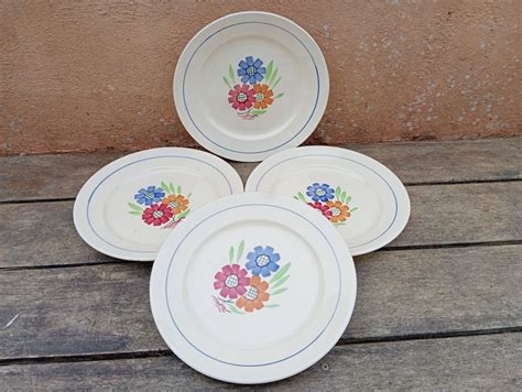 4 assiettes plates décor floral modèle Agnès de K G Lunéville 1910 20