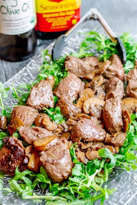 Beef Tenderloin Tips With Zip Sauce And Mushrooms On Arugula Bed