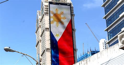 Philippine Flag From A Building Photos Philippine News Agency