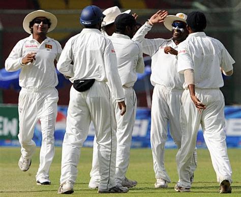 The Sri Lankans Celebrate The Dismissal Of Shoaib Malik Espncricinfo