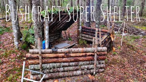 Survival Shelter Transformed Into A Super Shelter Pt 2 Bushcraft Building A Fort In The