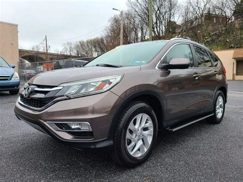 Rauls Auto Sales 2015 HONDA CR V 4DR