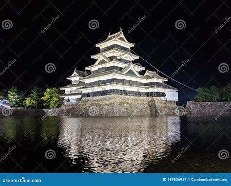 Reflection Of Matsumoto Castle With A Swan In Matsumoto Nagano Japan