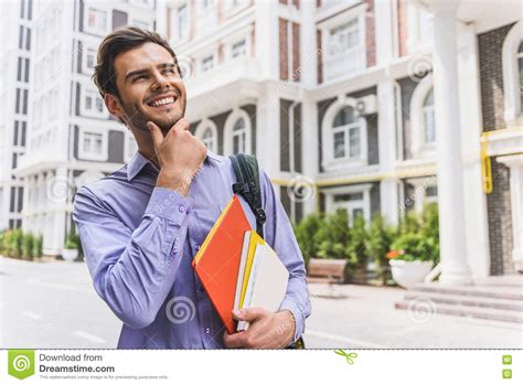 Cheerful Male Student With Books In City Stock Image Image Of Shirt