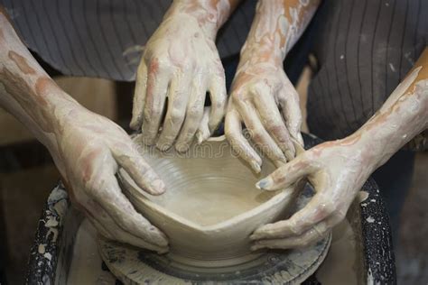 Pottery Making Smeared In Clay Hands Of Man And Woman On Potter`s