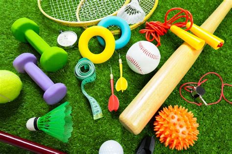 Premium Photo Various Sport Tools On Grass With Copy Space