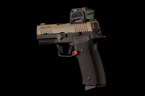 Springer Precision Launches The Extended Mag Release Paddle Rh For Sig Axg