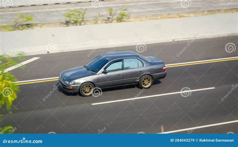 Modified Grey Toyota Great Corolla on Trans Jawa Highway Editorial ...