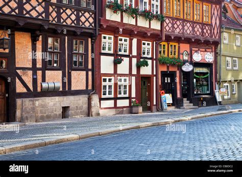 A Row Of Half Timbered Medieval Houses In A Cobbled Street In The Unesco World Heritage Town Of