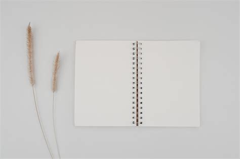 Premium Photo | Blank spiral bound sketchbook with barley dry flower