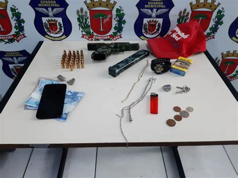 Dupla Carregando Pistola De Uso Restrito é Presa Em Mercado De Curitiba