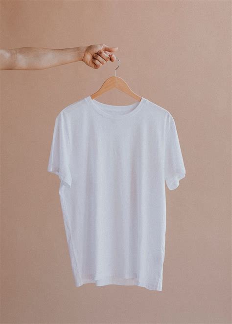 White shirt in a hanger | Premium Photo - rawpixel