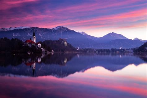 Sun rising over Lake Bled and the island church, Slovenia. Buy fine art ...