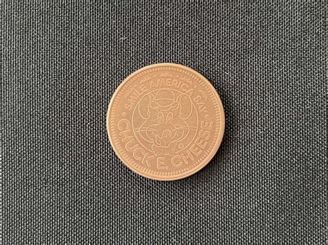 Chuck E Cheese Brass Arcade Game Tokens Coins Cents Pizza Time