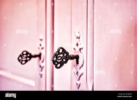 Pink Vintage Antique Doors With Old Skeleton Keys In Lock Wooden