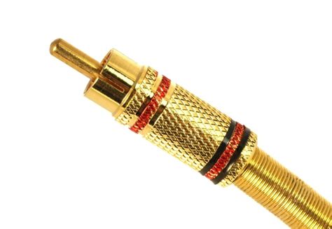 Golden Plated Rca Connector Isolated In White Photo Background And