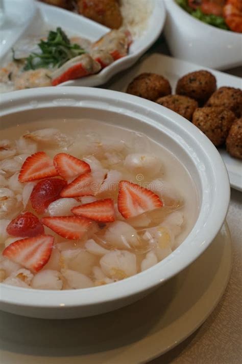 Chilled Lychee With Strawberry And Fried Sesame Nian Gao Dessert Stock