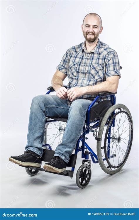 Smiling Disabled Man Sitting In A Wheelchair Stock Image Image Of