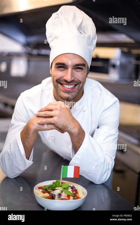 Handsome Chef Presenting Meal With Italian Flag Stock Photo Alamy