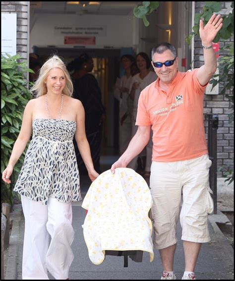 Photo Jean Marie Bigard Et Sa Femme Claudia Sortent De La Clinique