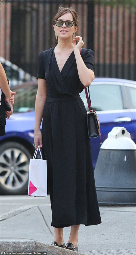 Dakota Johnson Wows In Elegant Loose Fitting Ensemble During Ny Outing