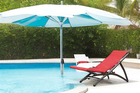 Premium Photo Umbrella And Chair Around Swimming Pool