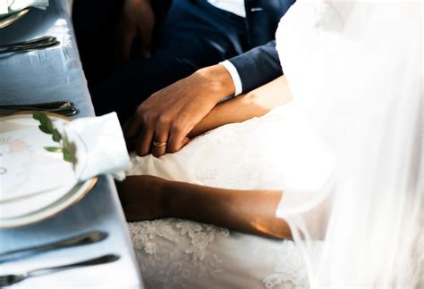 Premium Photo Newlywed African Descent Couple Holding Hands Together Love