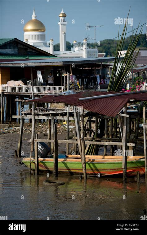 Sultan Omar Ali Saifuddien Mosque On Kedayan River With Boats And