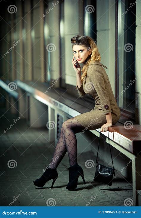 Attractive Blonde Girl Wearing Short Dress And High Heels Urban Scene Fashion Model With Long