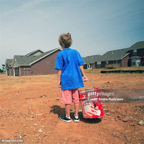 574 Boy Carrying Bucket Stock Photos High Res Pictures And Images
