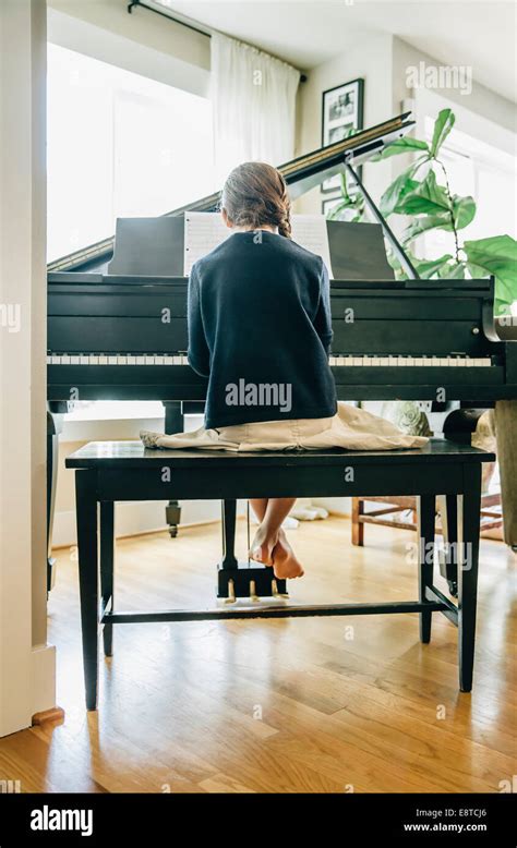 Girl Playing Piano Back Hi Res Stock Photography And Images Alamy