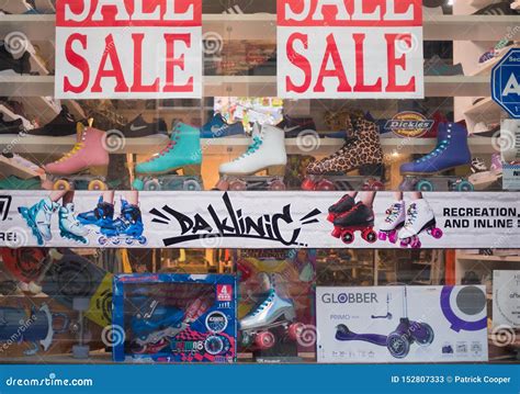 Roller Skates and Sneakers in Shop Window Display Editorial Stock Photo - Image of blades ...