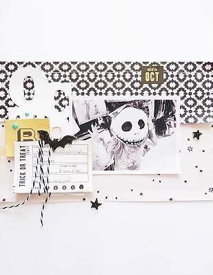 A Scrapbook Page With Black And White Paper