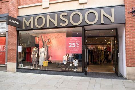 Entrance To Monsoon Fashion Clothing Store Shop Showing Logo Sign