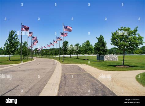 A View Of Memorial Park Surrounded By American Flags On Flag Poles